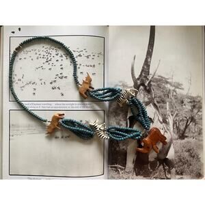 Necklace with wooden animals and beads